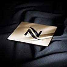 The Nespresso Club - image of a nespresso club invitation card on silk sheets